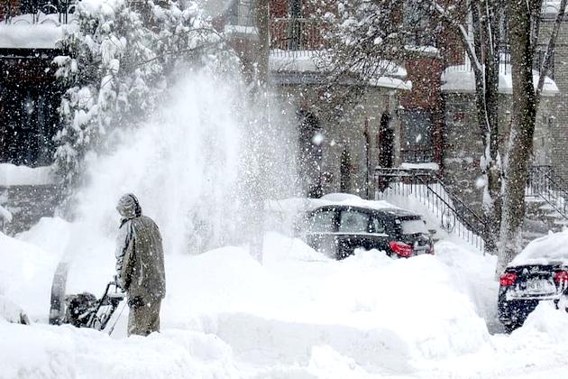 Airports, roads, schools closed as enormous snow strikes western U.S.